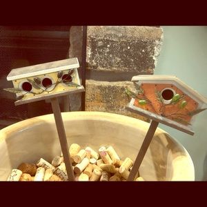 Two decorative bird house stakes